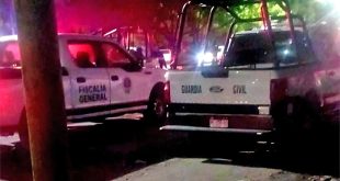 Escena del crimen en la avenida Tepalcatepec, zona de La Chilera en Apatzingán.
