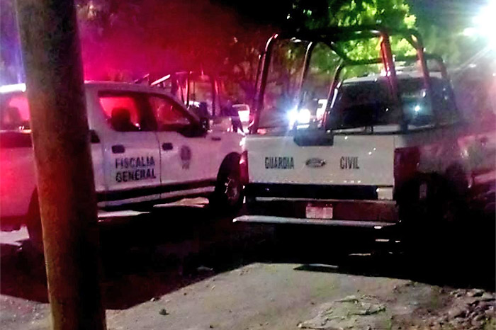 Escena del crimen en la avenida Tepalcatepec, zona de La Chilera en Apatzingán.