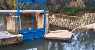 Compuerta de una de las presas del Distrito de Riego 045 rehabilitada por Conagua en el Oriente de Michoacán.