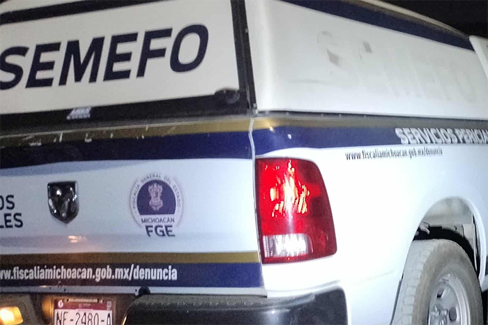 Elementos de la FGE Michoacán resguardando un predio en la comunidad de Loma Caliente, Morelia.