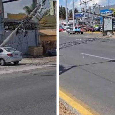 Camión de chatarra atorado en cables de alta tensión y postes caídos en el libramiento de Morelia.