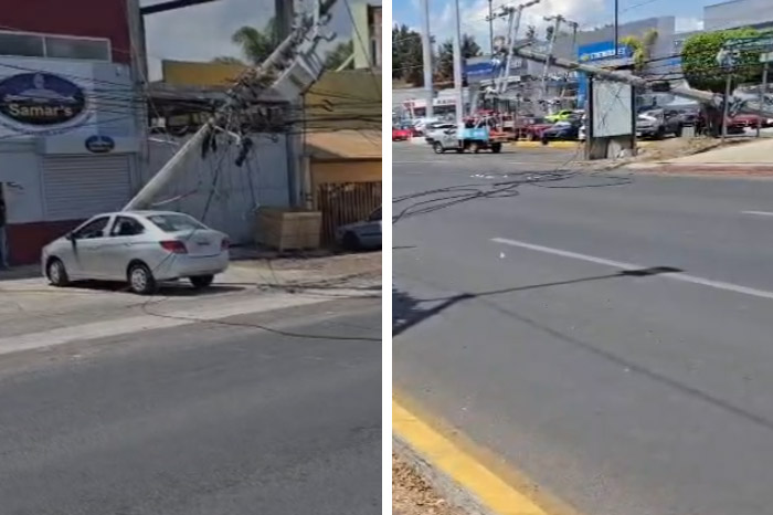 Camión de chatarra atorado en cables de alta tensión y postes caídos en el libramiento de Morelia.