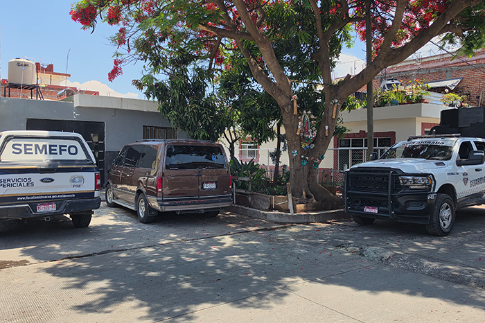 Fachada de un inmueble con impactos de bala y acordonamiento policial en la colonia Miguel Hidalgo.