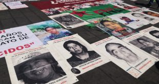 Logotipo de la Comisión Interamericana de Derechos Humanos (CIDH) frente a una bandera de México.