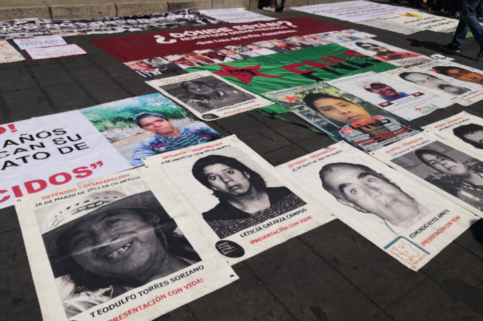 Logotipo de la Comisión Interamericana de Derechos Humanos (CIDH) frente a una bandera de México.