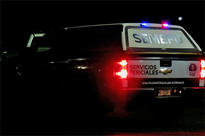 Acordonamiento policial en un predio de la comunidad de Españita, municipio de Parácuaro, tras el hallazgo de una mujer asesinada.