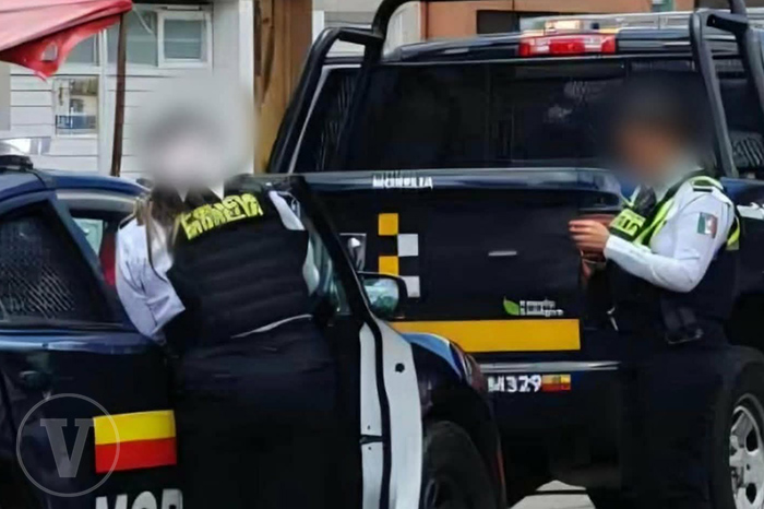 Patrulla de la policía municipal resguardando la calle Río Amatlán tras reporte de asalto en Morelia.