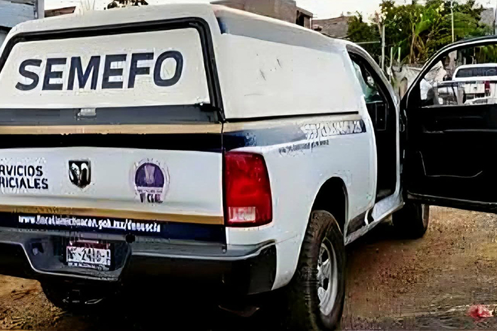 Unidades de la Guardia Civil y la Fiscalía en un operativo en la colonia Vista Hermosa de Apatzingán.