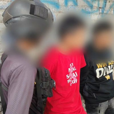 Elementos de seguridad privada y vialidad resguardando el perímetro tras una detención en la capital michoacana.