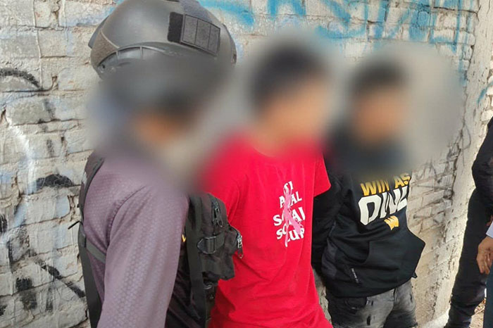 Elementos de seguridad privada y vialidad resguardando el perímetro tras una detención en la capital michoacana.