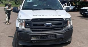 Elementos de la Fiscalía de Michoacán y la Guardia Nacional resguardan el predio El Estanque de Ambriz en Apatzingán.
