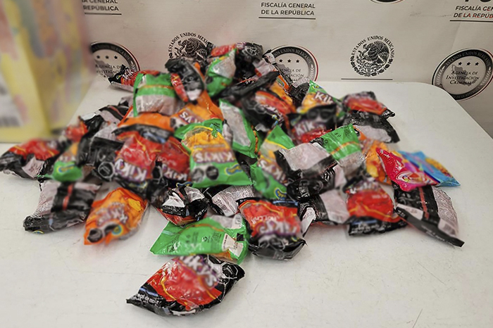 Metanfetamina asegurada en paquetes de dulces en empresa de mensajería de Morelia por la FGR