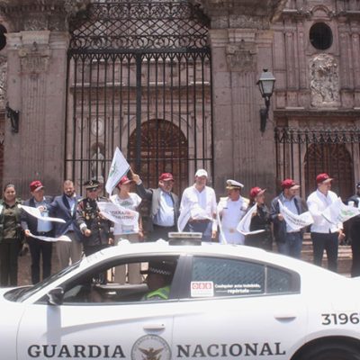 Autoridades federales y estatales durante el banderazo del Operativo Vacacional en Morelia.