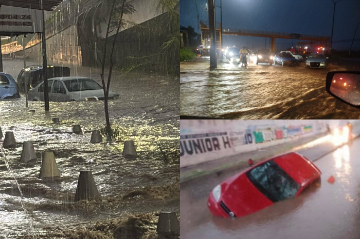 Vialidades inundadas y automóviles varados tras registrarse una intensa lluvia en Morelia.
