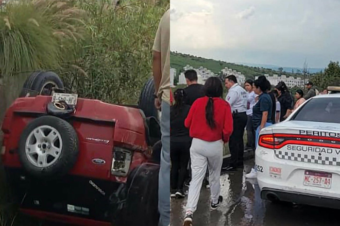 Rescate de una camioneta volcada en un canal pluvial del fraccionamiento Villas de Oriente