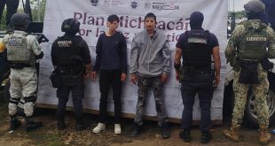 Elementos de la Secretaría de Seguridad Pública y patrullas desplegadas durante el operativo de rescate en Jacona, Michoacán.