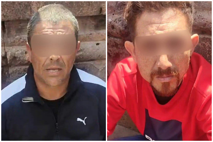 Unidades de la Policía Municipal de Morelia resguardando una vialidad durante la detención de dos sospechosos.